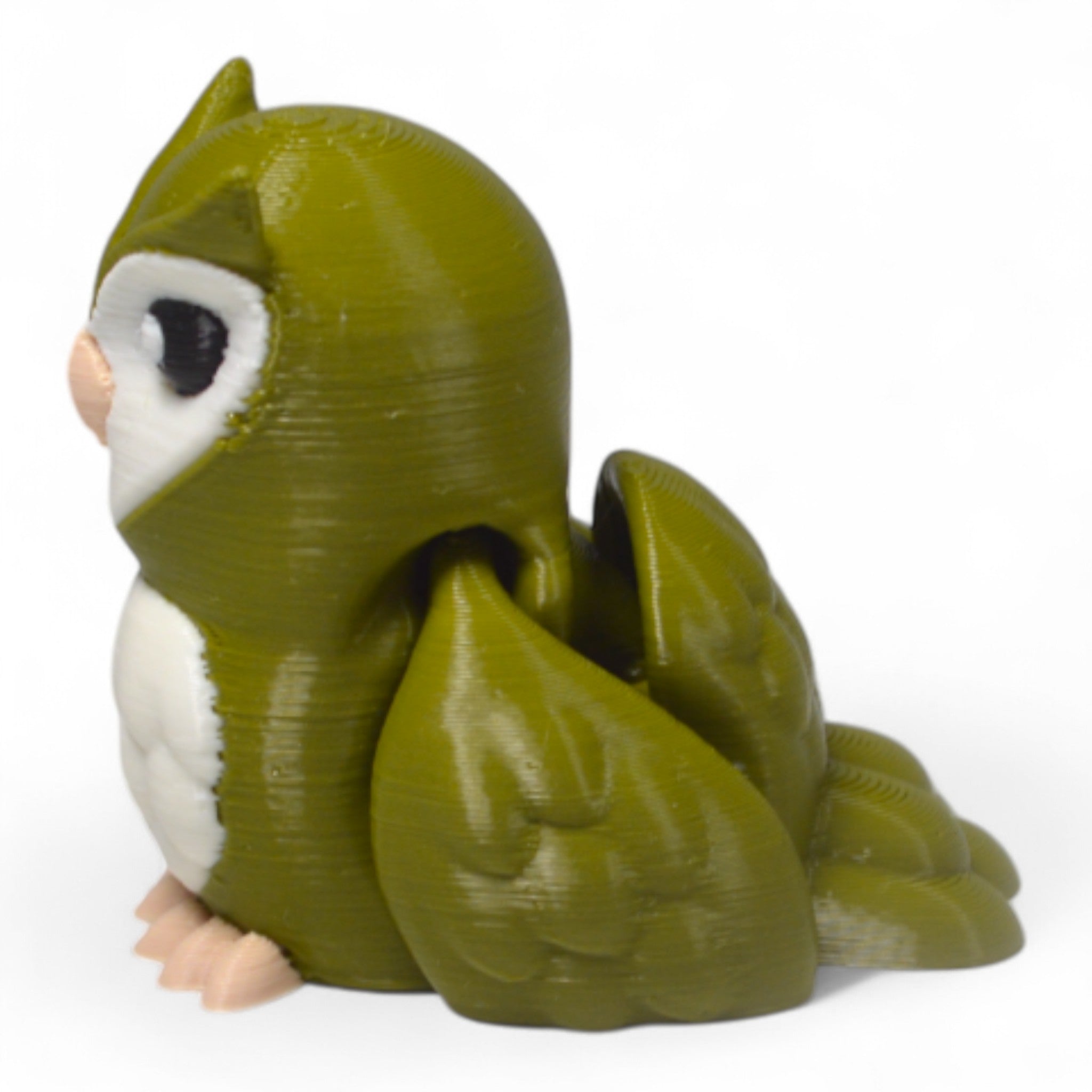 Yan açıdan yeşil Cribbliz baykuş figürü – detaylı kanatlarıyla eğlenceli oyuncak