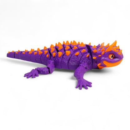 Eklemli gövde yapısı sayesinde kıvrılabilen Thorny Devil kertenkele oyuncağı, 3D stres oyuncağı.