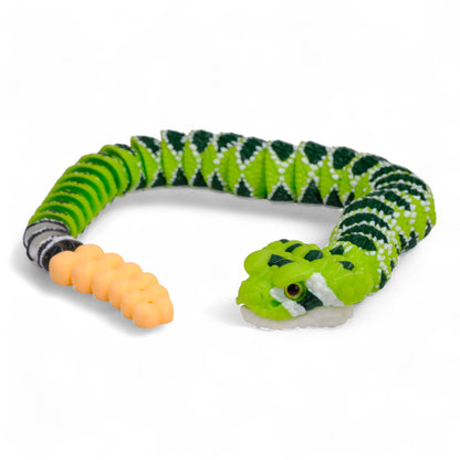 Stres giderici (fidget toy) özellikli, detaylı tasarıma sahip çıngıraklı yılan oyuncak figür.