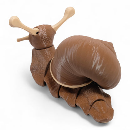 Odaklanmayı artıran stres giderici (fidget toy) hareketli salyangoz oyuncağı.